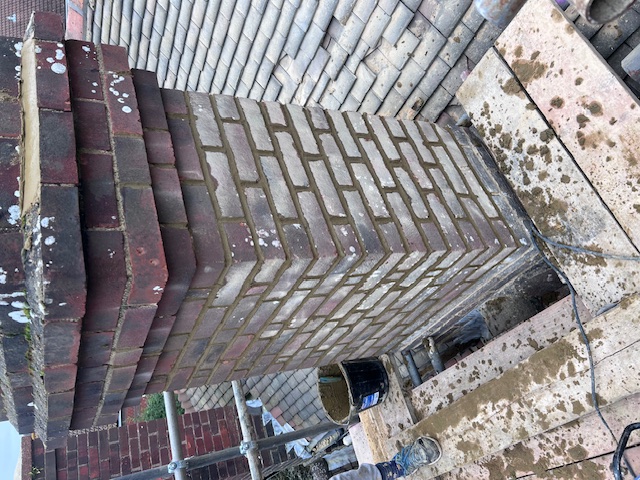 Chimney repointing South London - aerial view of professional chimney stack restoration