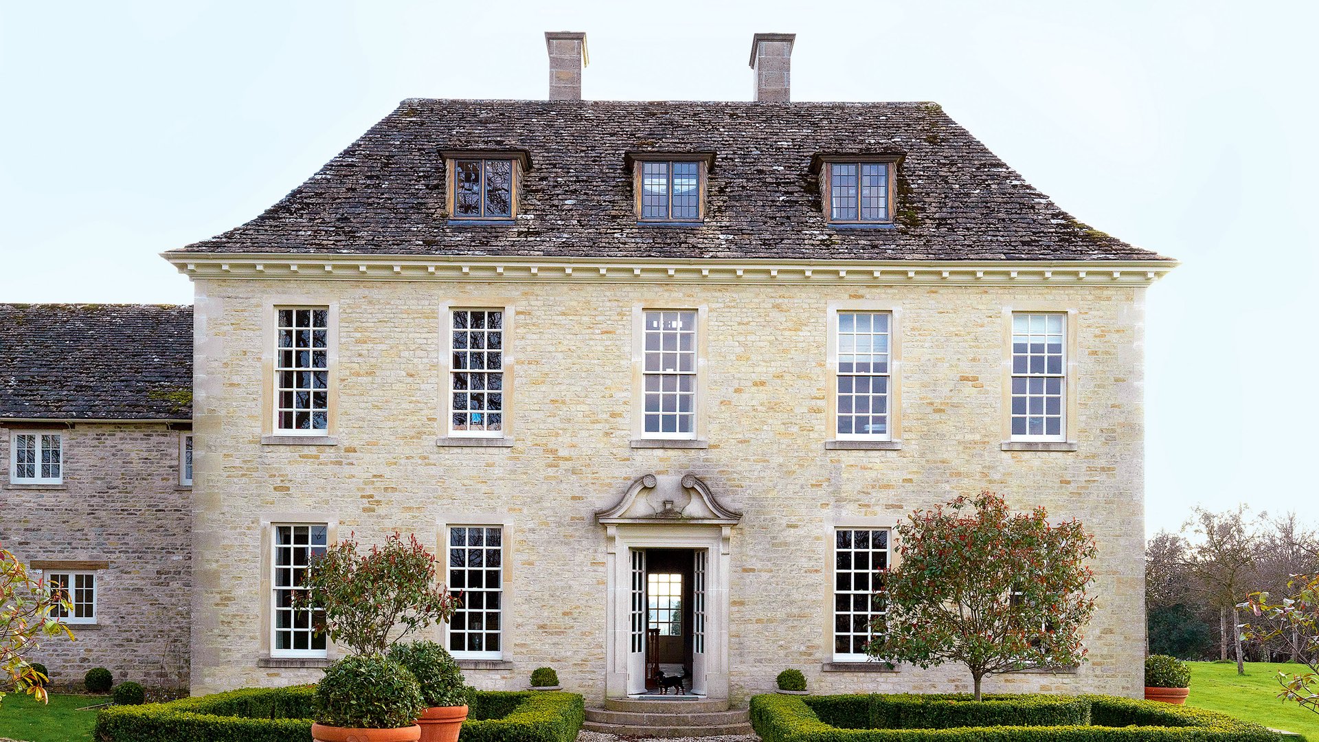 Heritage stone restoration specialists Kent - grand Cotswold stone manor house showing expert lime mortar repointing