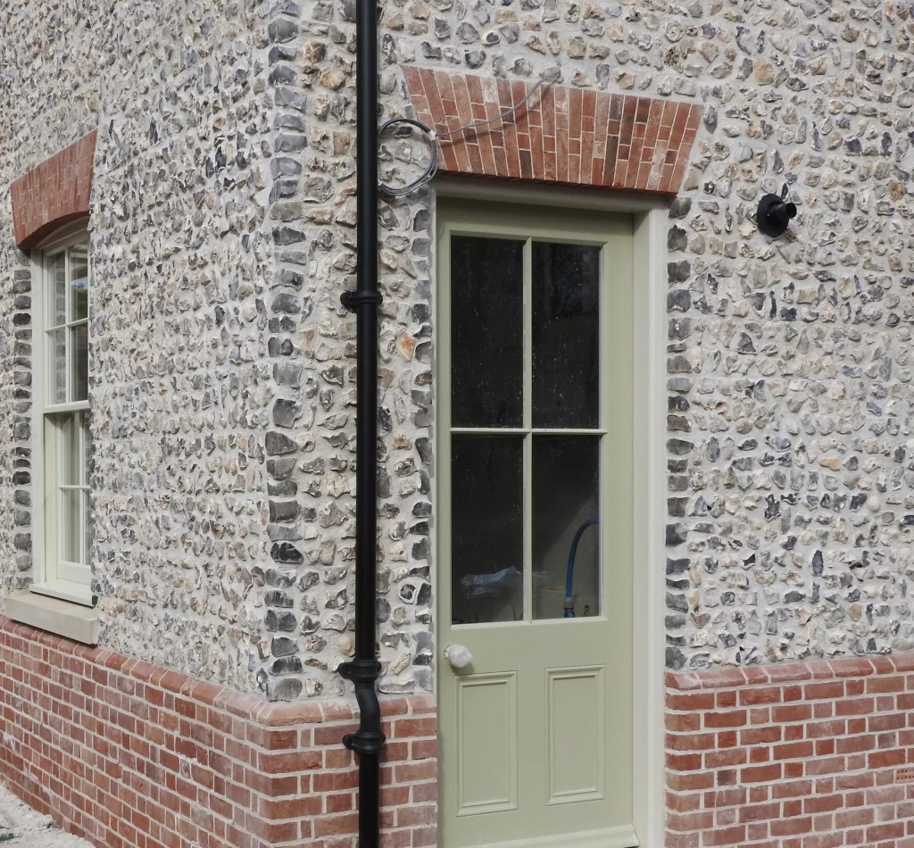 Flint and brick pointing Kent - traditional heritage restoration with lime mortar
