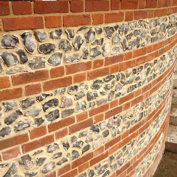 Knapped flint pointing Kent - specialist heritage flint and brick restoration with traditional craftsmanship