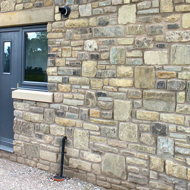 Reclaimed stone walling Kent - beautiful mixed random pattern stone pointing craftsmanship